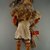 She-we-na (Zuni Pueblo). <em>Kachina Doll (Helele)</em>, late 19th century. Wood, pigment, hair, fur, feathers, cotton cloth, hide, plant fiber, silk ribbon, 17 5/16 x 6 7/8 in. (44 x 17.5 cm). Brooklyn Museum, Museum Expedition 1903, Museum Collection Fund, 03.325.4652. Creative Commons-BY (Photo: Brooklyn Museum, CUR.03.325.4652_back.jpg)