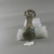 Roman. <em>Cosmetic Tube with Base</em>, 3rd-4th century C.E. Glass, 5 13/16 x Diam. 2 1/16 in. (14.7 x 5.3 cm). Brooklyn Museum, Gift of Robert B. Woodward, 03.34. Creative Commons-BY (Photo: Brooklyn Museum, CUR.03.34_bottom.jpg)