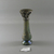 Roman. <em>Cosmetic Tube with Base</em>, 3rd-4th century C.E. Glass, 5 13/16 x Diam. 2 1/16 in. (14.7 x 5.3 cm). Brooklyn Museum, Gift of Robert B. Woodward, 03.34. Creative Commons-BY (Photo: Brooklyn Museum, CUR.03.34_view1.jpg)
