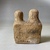 Possibly Greek. <em>Votive Statuette of Brick Red Terracotta</em>, 4th century B.C.E. Clay, slip, pigment, 3 1/4 × 2 3/8 × 1 3/4 in. (8.3 × 6 × 4.5 cm). Brooklyn Museum, Purchase gift of Robert B. Woodward and Carll H. de Silver, 04.18. Creative Commons-BY (Photo: Brooklyn Museum, CUR.04.18_view04.jpg)