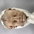Roman. <em>Child's Head from a Statuette</em>, 17th century C.E. Clay, 4 15/16 × 4 15/16 in. (12.5 × 12.5 cm). Brooklyn Museum, Purchase gift of Robert B. Woodward and Carll H. de Silver, 04.22. Creative Commons-BY (Photo: Brooklyn Museum, CUR.04.22_view01.jpg)