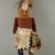Mau-i (She-we-na (Zuni Pueblo)). <em>Kachina Doll (Mukoko)</em>, late 19th-early 20th century. Wood, pigment, fur, feather, cotton, wool, 4 1/2 x 15in. (11.4 x 38.1cm). Brooklyn Museum, Museum Expedition 1904, Museum Collection Fund, 04.297.5338. Creative Commons-BY (Photo: Brooklyn Museum, CUR.04.297.5338_back.jpg)
