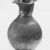 Italiote. <em>Oinochoe</em>, late 4th-3rd century B.C.E. Clay, slip, 9 15/16 x greatest diam. 5 7/8 in. (25.2 x 14.9 cm). Brooklyn Museum, Purchase gift of Robert B. Woodward and Carll H. de Silver, 04.9. Creative Commons-BY (Photo: Brooklyn Museum, CUR.04.9_NegB_print_bw-1.jpg)
