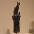  <em>Goddess Bastet as a Cat on a Lotus Column</em>, 664-30 B.C.E. Bronze, 7 11/16 x 1 15/16 x 4 1/8 in. (19.5 x 5 x 10.4 cm). Brooklyn Museum, Charles Edwin Wilbour Fund, 05.339. Creative Commons-BY (Photo: Brooklyn Museum, CUR.05.339_divinefelines_2013.jpg)