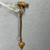 Roman. <em>Single Earring</em>, 1st-2nd century C.E. Gold, 05.508a: 1/2 in. (1.3 cm). Brooklyn Museum, Ella C. Woodward Memorial Fund, 05.508. Creative Commons-BY (Photo: Brooklyn Museum, CUR.05.508_overall03.jpg)