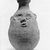  <em>Bottle with Grotesque Face</em>. Clay, 7 9/16 x Greatest diam. 4 5/16 in. (19.2 x 11 cm). Brooklyn Museum, Charles Edwin Wilbour Fund, 07.447.483. Creative Commons-BY (Photo: Brooklyn Museum, CUR.07.447.483_negA_print.jpg)