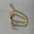 Egyptian. <em>Bracelet</em>. Shell (Ostrich shell, Mother-of-pearl), 15/16 x 4 1/2 in. (2.4 x 11.4 cm). Brooklyn Museum, Charles Edwin Wilbour Fund, 07.447.799g. Creative Commons-BY (Photo: Brooklyn Museum, CUR.07.447.799g_overall.JPG)