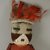 She-we-na (Zuni Pueblo). <em>Kachina Doll (Eka Ya Tosh Na-kwe)</em>, late 19th century. Wood, cloth, hide, feathers, string, pigment, wool, 14 3/8 x 5 7/8 x 3 7/8 in. (36.5 x 14.9 x 9.8 cm). Brooklyn Museum, Museum Expedition 1907, Museum Collection Fund, 07.467.8396. Creative Commons-BY (Photo: Brooklyn Museum, CUR.07.467.8396_detail.jpg)