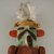 A:shiwi (Zuni Pueblo). <em>Kachina Doll (Kja-kja-lih)</em>, late 19th century. Wood, feather, cotton, pigment, wool yarn, plant fiber, 14 15/16 x 4 13/16 x 4 3/16 in. (37.9 x 12.2 x 10.6 cm). Brooklyn Museum, Museum Expedition 1907, Museum Collection Fund, 07.467.8425. Creative Commons-BY (Photo: Brooklyn Museum, CUR.07.467.8425_detail1.jpg)