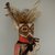 She-we-na (Zuni Pueblo). <em>Kachina Doll (Tsekohpastih)</em>, late 19th century. Wood, feather, cotton, wool, pigment, plant fiber, 15 x 4 5/8 x 5 in. (38.1 x 11.7 x 12.7 cm). Brooklyn Museum, Museum Expedition 1907, Museum Collection Fund, 07.467.8439. Creative Commons-BY (Photo: Brooklyn Museum, CUR.07.467.8439_detail.jpg)
