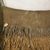 Possibly Shasta. <em>Apron with Fringe</em>, 19th century. Hide, bear grass, shell, pine nuts, 25 9/16 x 13 3/4 in.  (65.0 x 35.0 cm). Brooklyn Museum, Brooklyn Museum Collection, 08.469. Creative Commons-BY (Photo: Brooklyn Museum, CUR.08.469_view04.jpg)