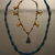  <em>Fly Pendants and Cylindrical and Spherical Beads</em>, ca. 1539-1292 B.C.E. Gold, lapis lazuli, Length: 9 11/16 in. (24.6 cm). Brooklyn Museum, Charles Edwin Wilbour Fund, 08.480.198. Creative Commons-BY (Photo: Brooklyn Museum, CUR.08.480.198_48.66.39_erg456.jpg)