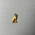  <em>Seated Cat Amulet</em>, 664-30 B.C.E. Sheet gold, 3/4 x 7/16 in. (1.9 x 1.2 cm). Brooklyn Museum, Charles Edwin Wilbour Fund, 08.480.211. Creative Commons-BY (Photo: Brooklyn Museum, CUR.08.480.211_overall.JPG)