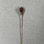  <em>Pin with Mounted Bead</em>, 30 B.C.E.-395 C.E. Gold, glass, Total length: 2 1/8 in. (5.4 cm). Brooklyn Museum, Charles Edwin Wilbour Fund, 08.480.221. Creative Commons-BY (Photo: Brooklyn Museum, CUR.08.480.221_overall02.JPG)