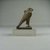  <em>Figure of a Horus Falcon</em>. Limestone (probably), 1 7/8 x 13/16 x 1 3/8 in. (4.8 x 2.1 x 3.5 cm). Brooklyn Museum, Charles Edwin Wilbour Fund, 08.480.75. Creative Commons-BY (Photo: Brooklyn Museum, CUR.08.480.75_view2.jpg)