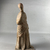 Possibly Greek. <em>Statue of a Woman</em>, in the style of 3rd century B.C.E. Terracotta, pigment, 8 5/16 × 3 5/8 × 2 3/8 in. (21.1 × 9.2 × 6 cm). Brooklyn Museum, Gift of A. Augustus Healy, 09.15. Creative Commons-BY (Photo: Brooklyn Museum, CUR.09.15_view02.jpeg)