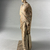 Possibly Greek. <em>Statue of a Woman</em>, in the style of 3rd century B.C.E. Terracotta, pigment, 8 5/16 × 3 5/8 × 2 3/8 in. (21.1 × 9.2 × 6 cm). Brooklyn Museum, Gift of A. Augustus Healy, 09.15. Creative Commons-BY (Photo: Brooklyn Museum, CUR.09.15_view03.jpeg)