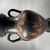 Greek. <em>Black-Figure Amphora</em>, late 6th century B.C.E. Clay, slip, 9 5/8 × Diam. 6 in. (24.5 × 15.3 cm). Brooklyn Museum, Gift of Robert B. Woodward, 09.35. Creative Commons-BY (Photo: Brooklyn Museum, CUR.09.35_view01.jpg.jpg)