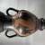 Greek. <em>Black-Figure Amphora</em>, late 6th century B.C.E. Clay, slip, 9 5/8 × Diam. 6 in. (24.5 × 15.3 cm). Brooklyn Museum, Gift of Robert B. Woodward, 09.35. Creative Commons-BY (Photo: Brooklyn Museum, CUR.09.35_view03.jpg.jpg)