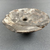 <em>Flat Circular Mace</em>, ca. 4400–3100 B.C.E. Volcanic rock, 1 1/4 x 4 1/8 in. (3.2 x 10.5 cm). Brooklyn Museum, Charles Edwin Wilbour Fund, 09.889.203. Creative Commons-BY (Photo: Brooklyn Museum, CUR.09.889.203_bottom02.jpg)