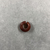  <em>Penannular Earring or Hair Ring</em>. Carnelian, 09.889.839.1: Diam. 1/4 × 11/16 in. (0.7 × 1.7 cm). Brooklyn Museum, Charles Edwin Wilbour Fund, 09.889.839.12. Creative Commons-BY (Photo: , CUR.09.889.839.12_view01.jpg)