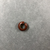  <em>Penannular Earring or Hair Ring</em>. Carnelian, Diam. 3/16 × 1/2 in. (0.4 × 1.3 cm). Brooklyn Museum, Charles Edwin Wilbour Fund, 09.889.839.2. Creative Commons-BY (Photo: , CUR.09.889.839.2_view01.jpg)