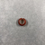  <em>Penannular Earring or Hair Ring</em>. Carnelian, 3/16 × 9/16 in. (0.5 × 1.4 cm). Brooklyn Museum, Charles Edwin Wilbour Fund, 09.889.839.4. Creative Commons-BY (Photo: , CUR.09.889.839.4_view02.jpg)