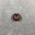  <em>Penannular Earring or Hair Ring</em>. Carnelian, 09.889.839.1: Diam. 1/4 × 11/16 in. (0.7 × 1.7 cm). Brooklyn Museum, Charles Edwin Wilbour Fund, 09.889.839.6. Creative Commons-BY (Photo: , CUR.09.889.839.6_view02.jpg)