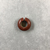  <em>Penannular Earring or Hair Ring</em>. Carnelian, 1/4 × 11/16 in. (0.6 × 1.7 cm). Brooklyn Museum, Charles Edwin Wilbour Fund, 09.889.839.7. Creative Commons-BY (Photo: , CUR.09.889.839.7_view01.jpg)