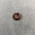  <em>Penannular Earring or Hair Ring</em>. Carnelian, 09.889.839.1: Diam. 1/4 × 11/16 in. (0.7 × 1.7 cm). Brooklyn Museum, Charles Edwin Wilbour Fund, 09.889.839.8. Creative Commons-BY (Photo: , CUR.09.889.839.8_view01.jpg)