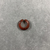  <em>Penannular Earring or Hair Ring</em>. Carnelian, 09.889.839.1: Diam. 1/4 × 11/16 in. (0.7 × 1.7 cm). Brooklyn Museum, Charles Edwin Wilbour Fund, 09.889.839.8. Creative Commons-BY (Photo: , CUR.09.889.839.8_view02.jpg)