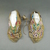  <em>Pair of Moccasins</em>, late 19th-early 20th century. Hide, beads Brooklyn Museum, Purchased with funds given by Herman Stutzer, 10.229.5a-b (Photo: Brooklyn Museum, CUR.10.229.5a-b_view1.jpg)