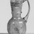 Roman. <em>Jug with Squat Grooved Body</em>, 3rd-5th century C.E. Glass, 3 7/16 x Diam. 1 13/16 in. (8.7 x 4.6 cm). Brooklyn Museum, Gift of Robert B. Woodward, 11.16. Creative Commons-BY (Photo: Brooklyn Museum, CUR.11.16_negA_bw.jpg)