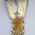 Osage. <em>Fan</em>, late 19th-early 20th century. Hide, eagle feather,porcupine quill,  beads, pigment, 5 1/2 x 14 in. (14 x 35.6 cm). Brooklyn Museum, Museum Expedition 1911, Museum Collection Fund, 11.694.8987. Creative Commons-BY (Photo: Brooklyn Museum, CUR.11.694.8987_view2.jpg)