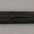Ainu. <em>Long Prayer Stick</em>. Wood, 1 1/4 x 13 1/8 in. (3.2 x 33.4 cm). Brooklyn Museum, Gift of Herman Stutzer, 12.232. Creative Commons-BY (Photo: Brooklyn Museum, CUR.12.232_top.jpg)