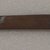 Ainu. <em>Long Prayer Stick</em>. Wood, 13/16 x 13 15/16 in. (2.1 x 35.4 cm). Brooklyn Museum, Gift of Herman Stutzer, 12.235. Creative Commons-BY (Photo: Brooklyn Museum, CUR.12.235_bottom.jpg)