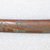 Ainu. <em>Long Curved Prayer Stick</em>. Wood, 1 x 12 5/16 in. (2.5 x 31.3 cm). Brooklyn Museum, Gift of Herman Stutzer, 12.255. Creative Commons-BY (Photo: Brooklyn Museum, CUR.12.255_top.jpg)