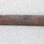 Ainu. <em>Long Curved Prayer Stick</em>. Wood, 7/8 x 13 3/16 in. (2.3 x 33.5 cm). Brooklyn Museum, Gift of Herman Stutzer, 12.267. Creative Commons-BY (Photo: Brooklyn Museum, CUR.12.267_bottom.jpg)
