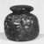 Islamic. <em>Low and Wide Jar</em>, 9th-10th century C.E. Glass, 2 1/2 x Diam. 2 13/16 in. (6.3 x 7.2 cm). Brooklyn Museum, Purchased with funds given by Robert B. Woodward, 12.26. Creative Commons-BY (Photo: Brooklyn Museum, CUR.12.26_negA_bw.jpg)