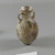 Roman. <em>Bulbous Bottle with Band of Scrolls</em>, 1st century C.E. Glass, 2 13/16 x 1 5/8 in. (7.1 x 4.2 cm). Brooklyn Museum, Gift of Aziz Khayat, 12.2. Creative Commons-BY (Photo: Brooklyn Museum, CUR.12.2_view1.jpg)
