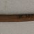 Ainu. <em>Curved Prayer Stick</em>. Wood, 11/16 x 11 5/16 in. (1.8 x 28.7 cm). Brooklyn Museum, Gift of Herman Stutzer, 12.300. Creative Commons-BY (Photo: Brooklyn Museum, CUR.12.300_bottom.jpg)