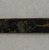 Ainu. <em>Prayer Stick</em>. Lacquer, 1 x 12 1/16 in. (2.5 x 30.7 cm). Brooklyn Museum, Gift of Herman Stutzer, 12.308. Creative Commons-BY (Photo: Brooklyn Museum, CUR.12.308_bottom.jpg)