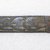 Ainu. <em>Curved Prayer Stick</em>. Wood, 1 1/8 x 12 3/16 in. (2.8 x 31 cm). Brooklyn Museum, Gift of Herman Stutzer, 12.334. Creative Commons-BY (Photo: Brooklyn Museum, CUR.12.334_top.jpg)