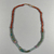  <em>Single-strand Necklace</em>, ca. 2008-1630 B.C.E. Faience, amethyst, carnelian, As strung, greatest diam. 1/4 × 17 5/16 in. (0.7 × 44 cm). Brooklyn Museum, Gift of the Egypt Exploration Society, 12.911.6. Creative Commons-BY (Photo: Brooklyn Museum, CUR.12.911.6_view01.jpg)