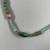  <em>Single-strand Necklace</em>, ca. 2008-1630 B.C.E. Faience, amethyst, carnelian, As strung, greatest diam. 1/4 × 17 5/16 in. (0.7 × 44 cm). Brooklyn Museum, Gift of the Egypt Exploration Society, 12.911.6. Creative Commons-BY (Photo: Brooklyn Museum, CUR.12.911.6_view02.jpg)