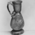 Roman. <em>Pitcher</em>, 1st-3rd century C.E. Glass, 3 1/4 x Diam. 1 3/8 in. (8.3 x 3.5 cm). Brooklyn Museum, Gift of R. B. Woodward, 15.70. Creative Commons-BY (Photo: Brooklyn Museum, CUR.15.70_negA_bw.jpg)