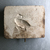  <em>Mold for Making a Benu Bird</em>. Limestone, 5 1/16 × 6 5/16 × 1 1/4 in. (12.8 × 16 × 3.1 cm). Brooklyn Museum, Gift of Evangeline Wilbour Blashfield, Theodora Wilbour, and Victor Wilbour honoring the wishes of their mother, Charlotte Beebe Wilbour, as a memorial to their father, Charles Edwin Wilbour, 16.129. Creative Commons-BY (Photo: , CUR.16.129_view01.jpg)