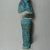  <em>Funerary Figurine of Neskhons</em>, ca. 1075-945 B.C.E. Faience, 6 13/16 × 2 1/4 in. (17.3 × 5.7 cm). Brooklyn Museum, Gift of Evangeline Wilbour Blashfield, Theodora Wilbour, and Victor Wilbour honoring the wishes of their mother, Charlotte Beebe Wilbour, as a memorial to their father, Charles Edwin Wilbour, 16.184. Creative Commons-BY (Photo: Brooklyn Museum, CUR.16.184_front.jpg)