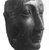  <em>Face from a Sarcophagus Cover</em>, ca. 1539-1400 B.C.E. Granite, 6 5/8 × 6 1/2 × 3 3/8 in. (16.8 × 16.5 × 8.6 cm). Brooklyn Museum, Gift of Evangeline Wilbour Blashfield, Theodora Wilbour, and Victor Wilbour honoring the wishes of their mother, Charlotte Beebe Wilbour, as a memorial to their father, Charles Edwin Wilbour, 16.207. Creative Commons-BY (Photo: Brooklyn Museum, CUR.16.207_NegA_print_bw.jpg)