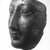  <em>Face from a Sarcophagus Cover</em>, ca. 1539-1400 B.C.E. Granite, 6 5/8 × 6 1/2 × 3 3/8 in. (16.8 × 16.5 × 8.6 cm). Brooklyn Museum, Gift of Evangeline Wilbour Blashfield, Theodora Wilbour, and Victor Wilbour honoring the wishes of their mother, Charlotte Beebe Wilbour, as a memorial to their father, Charles Edwin Wilbour, 16.207. Creative Commons-BY (Photo: Brooklyn Museum, CUR.16.207_NegC_print_bw.jpg)
